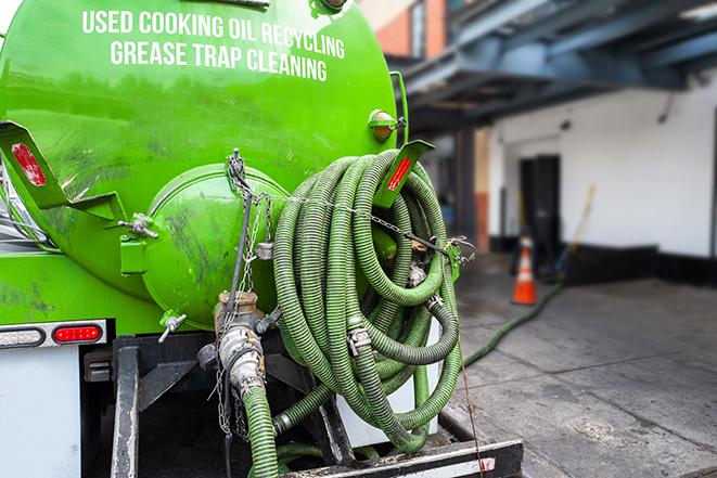 grease trap pumping truck servicing a restaurant in Bedford, PA